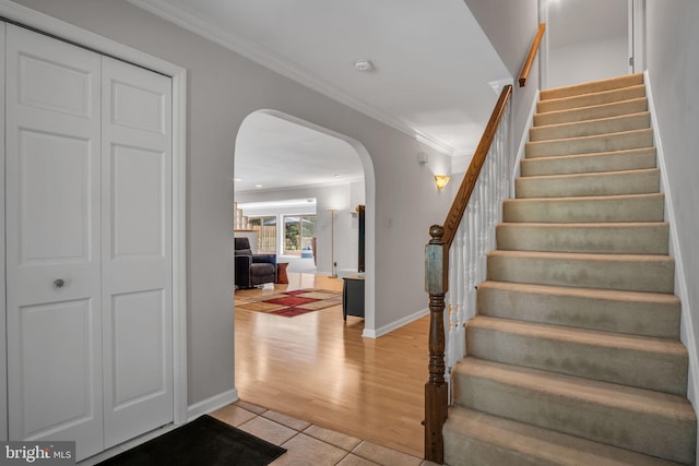 220 Longview Blvd, Gettysburg, PA 17325 - staircase with arched walkways, ornamental molding, and wood finished floors