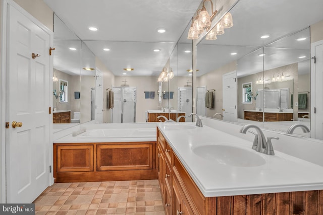 220 Longview Blvd, Gettysburg, PA 17325 - bathroom with recessed lighting, double vanity, a garden tub, a shower stall, and a chandelier