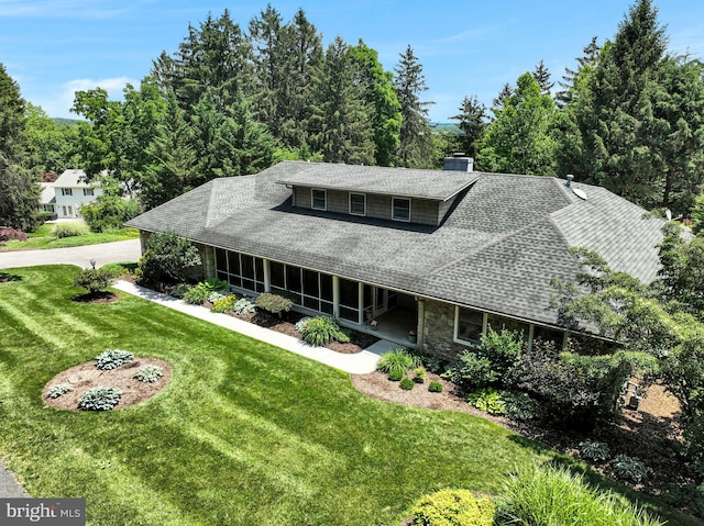 220 Longview Blvd, Gettysburg, PA 17325 - farmhouse-style home with a shingled roof, a front lawn, a chimney, and stone siding