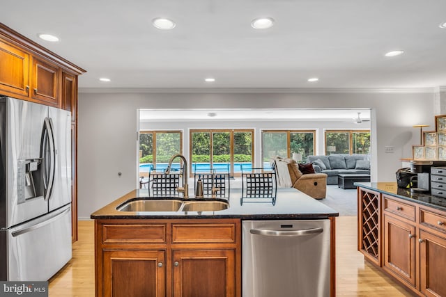 220 Longview Blvd, Gettysburg, PA 17325 - kitchen with appliances with stainless steel finishes, wine cooler, plenty of natural light, dark stone countertops, and ornamental molding