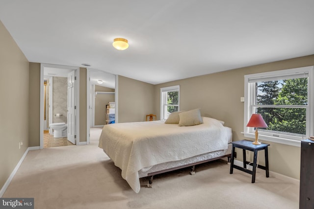 220 Longview Blvd, Gettysburg, PA 17325 - bedroom with carpet floors, ensuite bathroom, and lofted ceiling