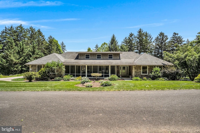 220 Longview Blvd, Gettysburg, PA 17325 - view of front of property featuring a sunroom, a front lawn, and stone siding