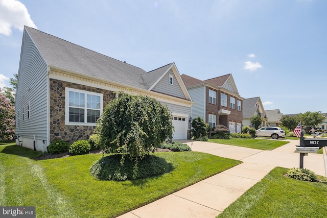 6037 Calumet Ct, Gainesville, VA 20155 - view of property featuring concrete driveway, stone siding, a front yard, roof with shingles, and a residential view