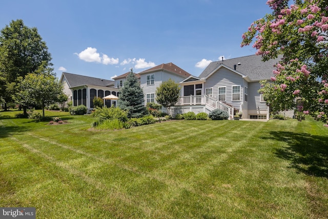 6037 Calumet Ct, Gainesville, VA 20155 - back of property featuring a lawn and stairs