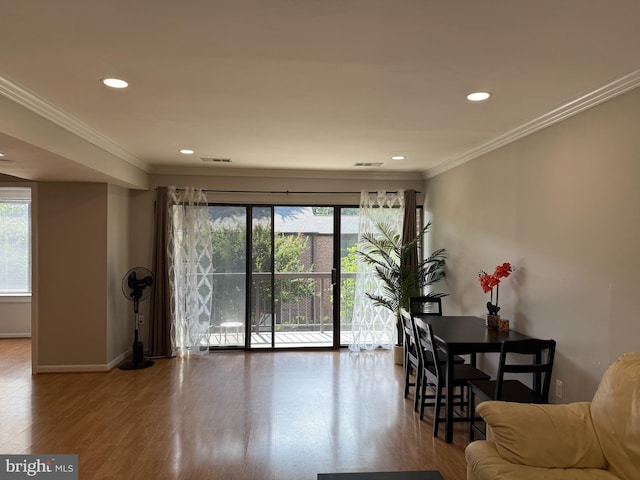 9711 Kings Crown Ct Unit 101, Fairfax, VA 22031 - living room with healthy amount of natural light, wood finished floors, recessed lighting, and ornamental molding