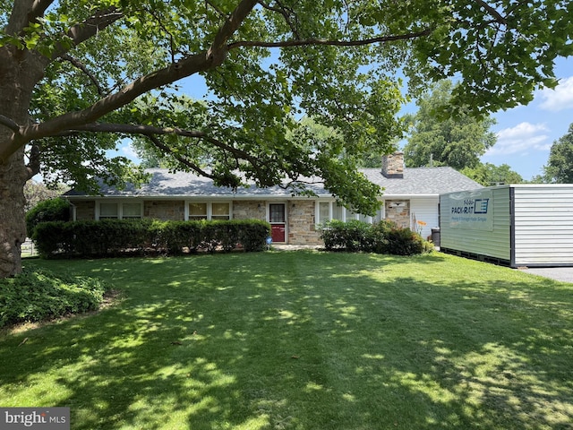 8910 Wilton Ave, Ellicott City, MD 21043 - view of front of house with a chimney and a front yard