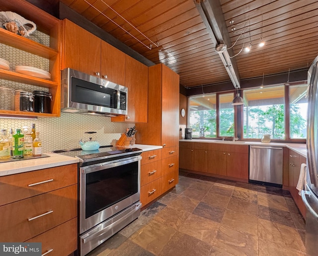 617 Old Mill Rd, Gettysburg, PA 17325 - kitchen with appliances with stainless steel finishes, wood ceiling, light countertops, and tasteful backsplash