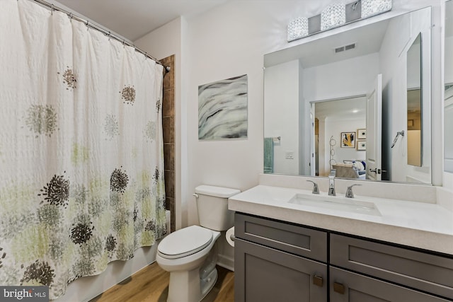 6107 Fairview Farm Dr Unit 306, Alexandria, VA 22315 - full bath featuring vanity, shower / bathtub combination with curtain, and wood finished floors