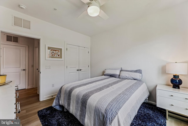 6107 Fairview Farm Dr Unit 306, Alexandria, VA 22315 - bedroom with wood finished floors, a closet, and ceiling fan