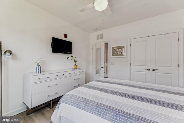 6107 Fairview Farm Dr Unit 306, Alexandria, VA 22315 - bedroom with a closet, wood finished floors, and a ceiling fan