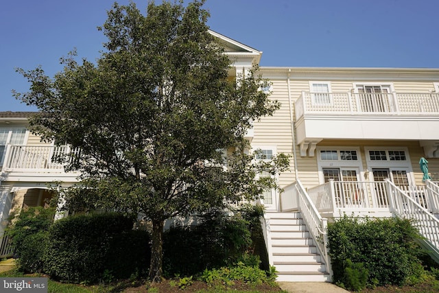 38337 N Mill Ln Unit 116, Ocean View, DE 19970 - view of front of house featuring stairway and a balcony