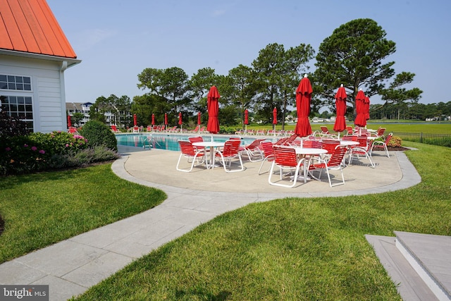 38337 N Mill Ln Unit 116, Ocean View, DE 19970 - view of patio / terrace with a community pool