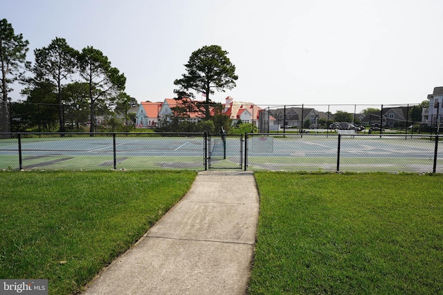 38337 N Mill Ln Unit 116, Ocean View, DE 19970 - view of tennis court featuring a gate and a residential view