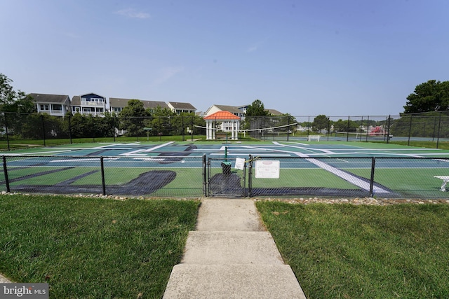 38337 N Mill Ln Unit 116, Ocean View, DE 19970 - surrounding community with a tennis court and a gate