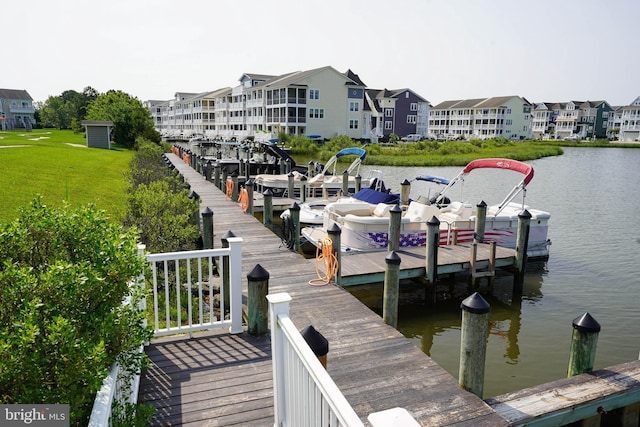 38337 N Mill Ln Unit 116, Ocean View, DE 19970 - dock with a water view, a lawn, and a residential view