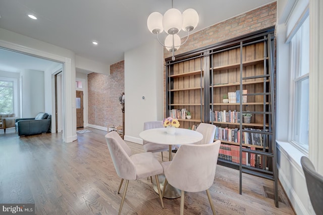 1842 N Capitol St NW, Washington, DC 20002 - dining room featuring brick wall, wood finished floors, and recessed lighting