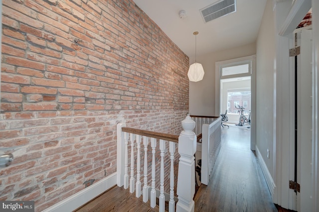 1842 N Capitol St NW, Washington, DC 20002 - corridor with an upstairs landing, brick wall, and wood finished floors