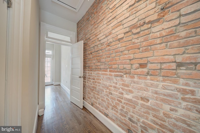 1842 N Capitol St NW, Washington, DC 20002 - corridor featuring brick wall and wood finished floors