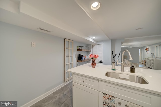 1842 N Capitol St NW, Washington, DC 20002 - kitchen with light countertops, white cabinets, and recessed lighting
