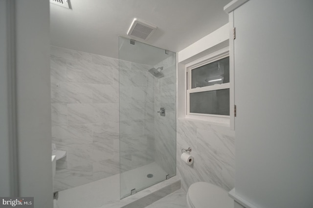 1842 N Capitol St NW, Washington, DC 20002 - full bath with a marble finish shower, marble finish flooring, and tile walls