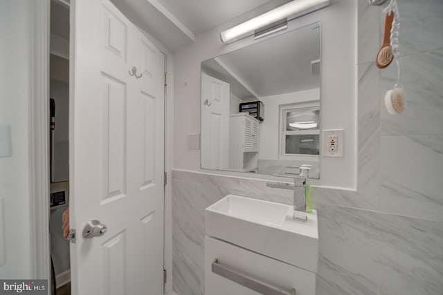 1842 N Capitol St NW, Washington, DC 20002 - bathroom featuring vanity, tile walls, and wainscoting