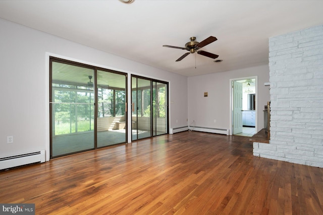 3990 View Top Rd, Ellicott City, MD 21042 - empty room with a baseboard radiator, ceiling fan, and wood finished floors