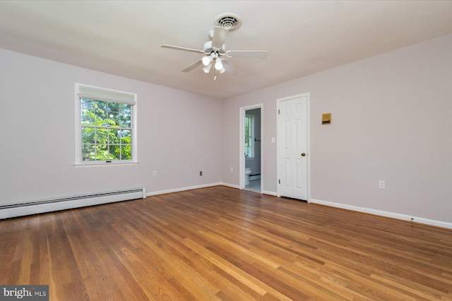 3990 View Top Rd, Ellicott City, MD 21042 - unfurnished room featuring wood finished floors, ceiling fan, a baseboard heating unit, and baseboard heating