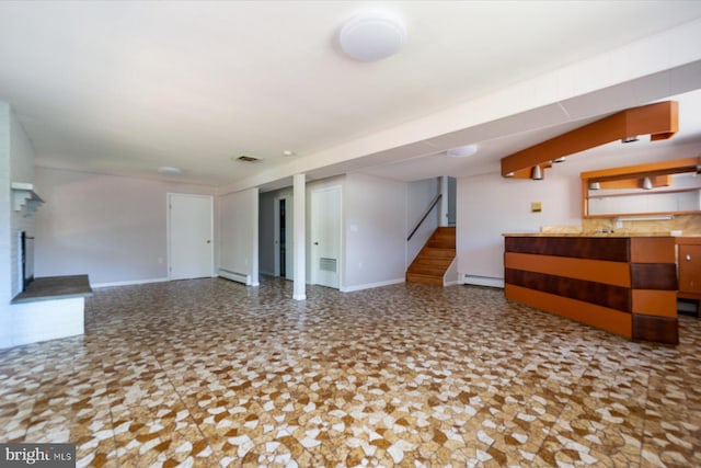 3990 View Top Rd, Ellicott City, MD 21042 - unfurnished living room featuring stairway and a baseboard heating unit