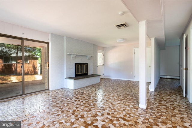 3990 View Top Rd, Ellicott City, MD 21042 - unfurnished living room featuring a baseboard radiator and a brick fireplace