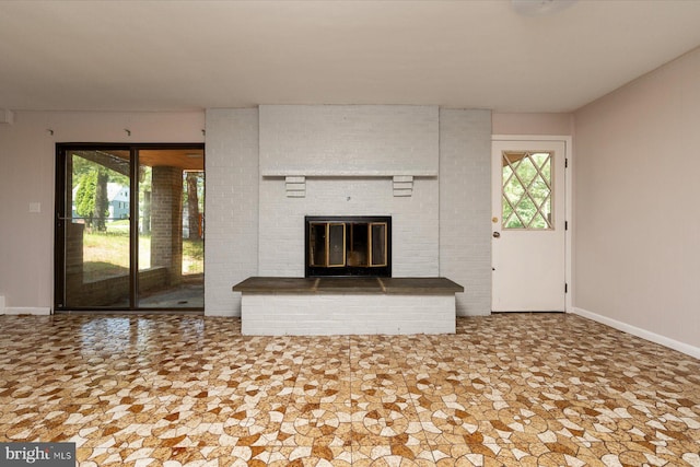 3990 View Top Rd, Ellicott City, MD 21042 - unfurnished living room with baseboards and a fireplace
