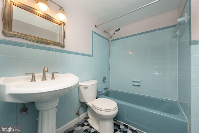 3990 View Top Rd, Ellicott City, MD 21042 - full bathroom featuring bathing tub / shower combination, tile walls, and a wainscoted wall