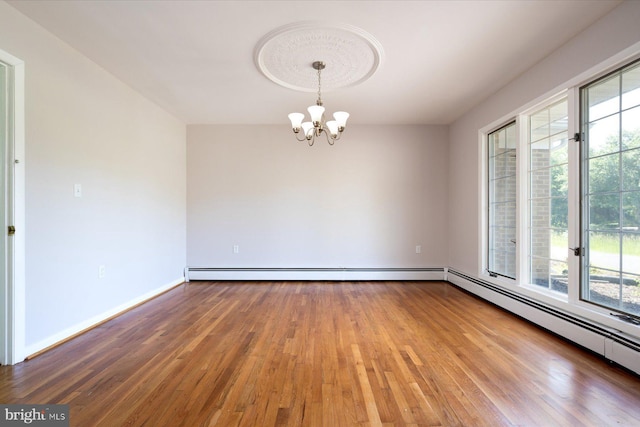3990 View Top Rd, Ellicott City, MD 21042 - unfurnished room with a chandelier, hardwood / wood-style flooring, and plenty of natural light