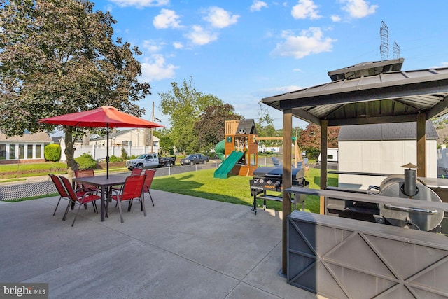 260 Irvington Pl, Hamilton, NJ 08610 - view of patio / terrace with a playground, outdoor dining area, and a grill