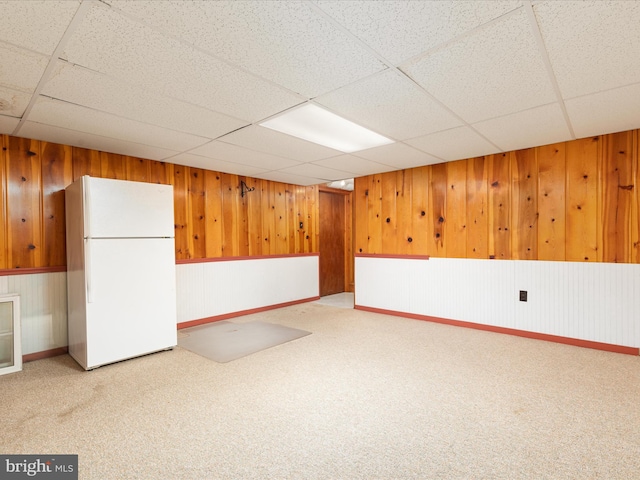 55 W Duck St, Front Royal, VA 22630 - finished below grade area featuring freestanding refrigerator, light carpet, a drop ceiling, and wooden walls