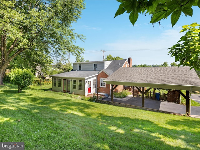 55 W Duck St, Front Royal, VA 22630 - rear view of house featuring a lawn, a chimney, and roof with shingles