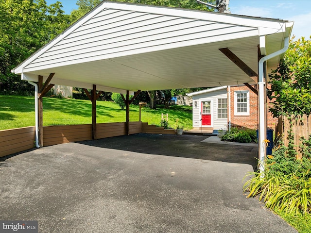 55 W Duck St, Front Royal, VA 22630 - view of car parking featuring a carport and asphalt driveway