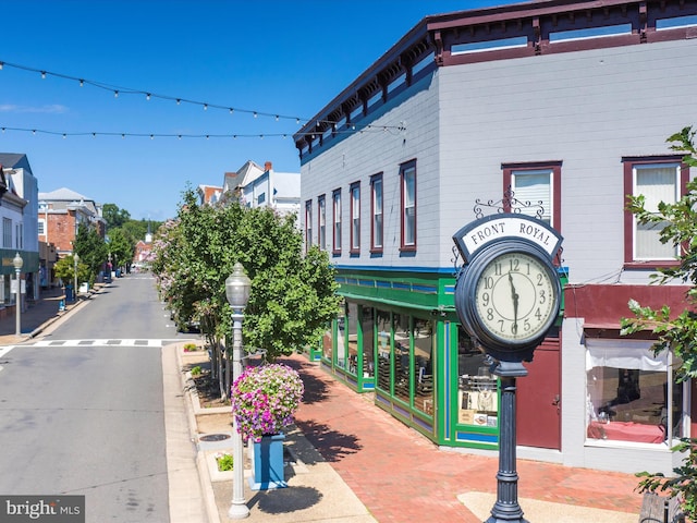 55 W Duck St, Front Royal, VA 22630 - view of asphalt road featuring curbs, sidewalks, and street lights