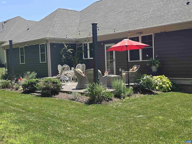 109 Stonecrest Ave, Waynesboro, VA 22980 - back of property with a patio, a lawn, and roof with shingles