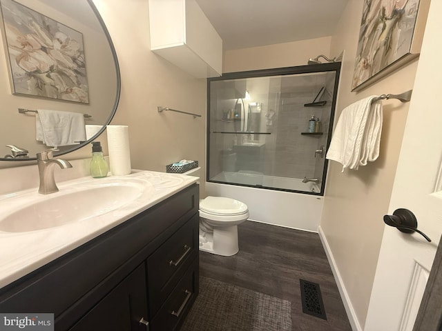 7 Old Farm Ln, New Freedom, PA 17349 - full bath with vanity, enclosed tub / shower combo, and wood finished floors