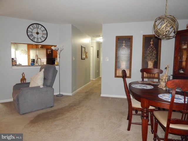 204 Kimary Ct Unit 1A, Forest Hill, MD 21050 - dining space featuring light colored carpet and a chandelier