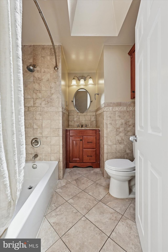 260 Rock St, Philadelphia, PA 19128 - full bath with tile walls, vanity, shower / bathtub combination with curtain, tile patterned flooring, and wainscoting