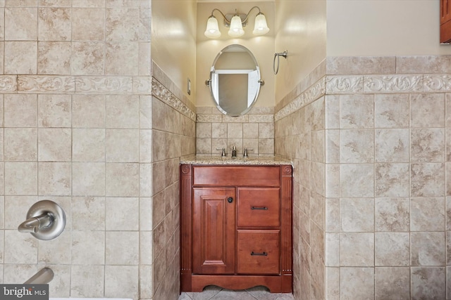 260 Rock St, Philadelphia, PA 19128 - bathroom featuring tile walls, vanity, and wainscoting