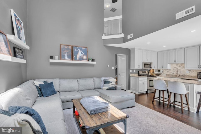 506 Masters Dr, Blackwood, NJ 08012 - living area with a towering ceiling, dark wood-style floors, and recessed lighting