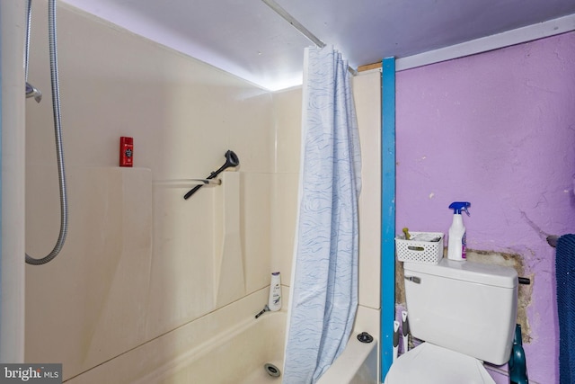 5563 Loretto Ave, Philadelphia, PA 19124 - bathroom featuring shower / bathtub combination with curtain and toilet