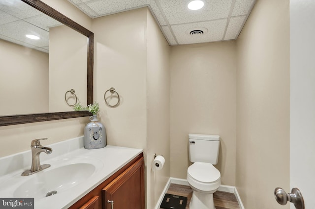 28 Wister Way, Reading, PA 19606 - bathroom featuring a paneled ceiling, vanity, and wood finished floors