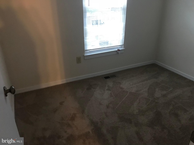 426 Shady Glen Dr, Capitol Heights, MD 20743 - empty room with carpet floors and baseboards