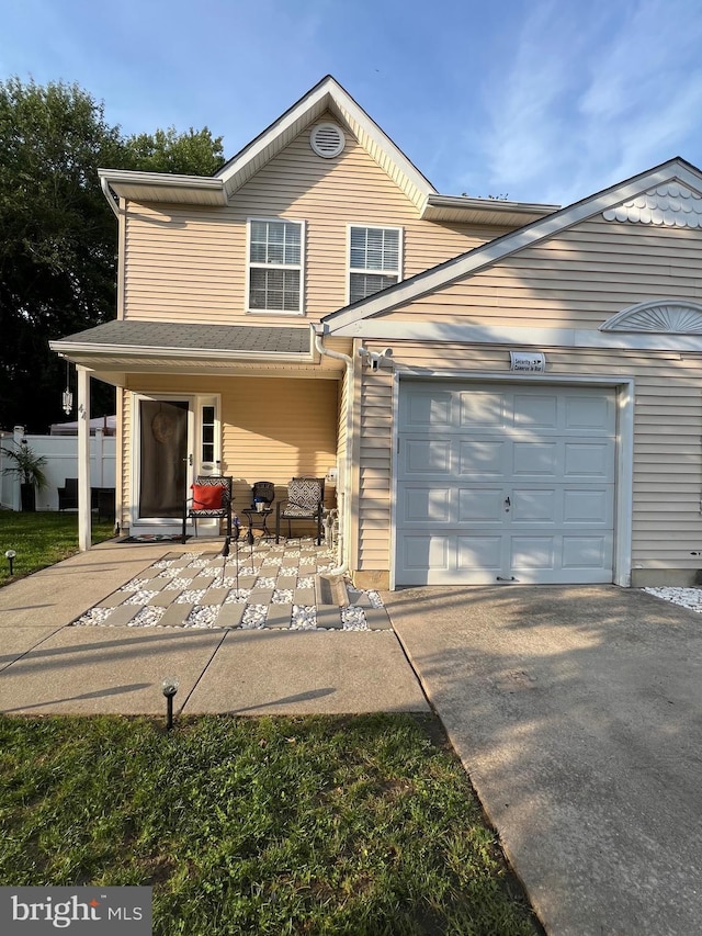 44 Meadowrue Ln, Sicklerville, NJ 08081 - view of front of property with concrete driveway, a garage, and covered porch