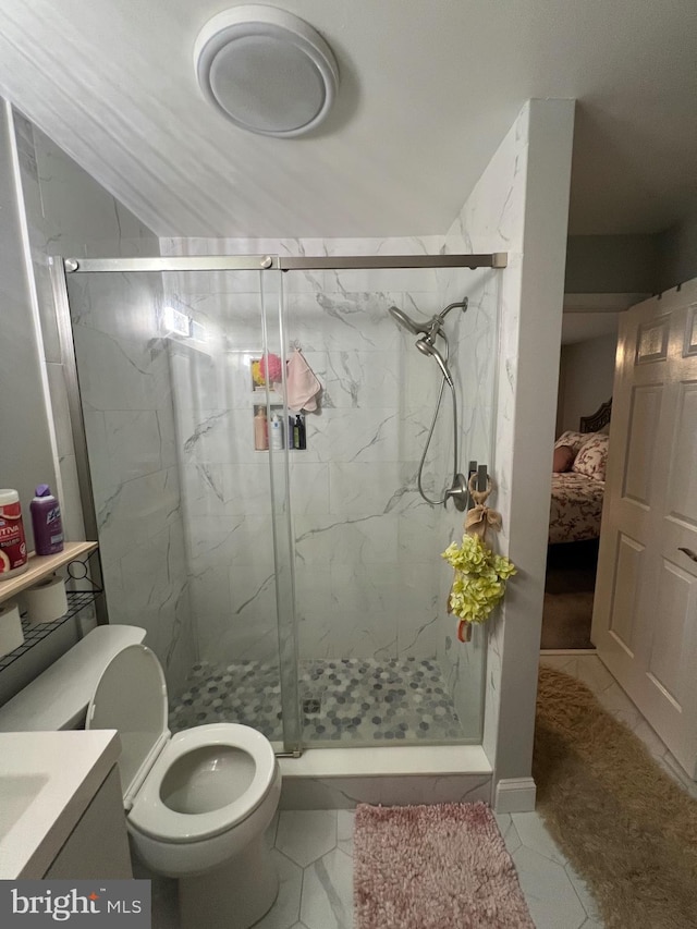 44 Meadowrue Ln, Sicklerville, NJ 08081 - ensuite bathroom with a marble finish shower, vanity, and marble look tiles