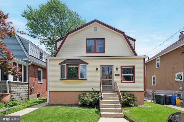 1102 Walnut, Collingdale, PA 19023 - dutch colonial featuring a gambrel roof and a front yard