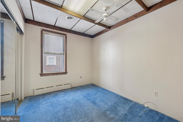 1102 Walnut, Collingdale, PA 19023 - unfurnished room featuring a baseboard radiator, carpet flooring, beam ceiling, and a ceiling fan